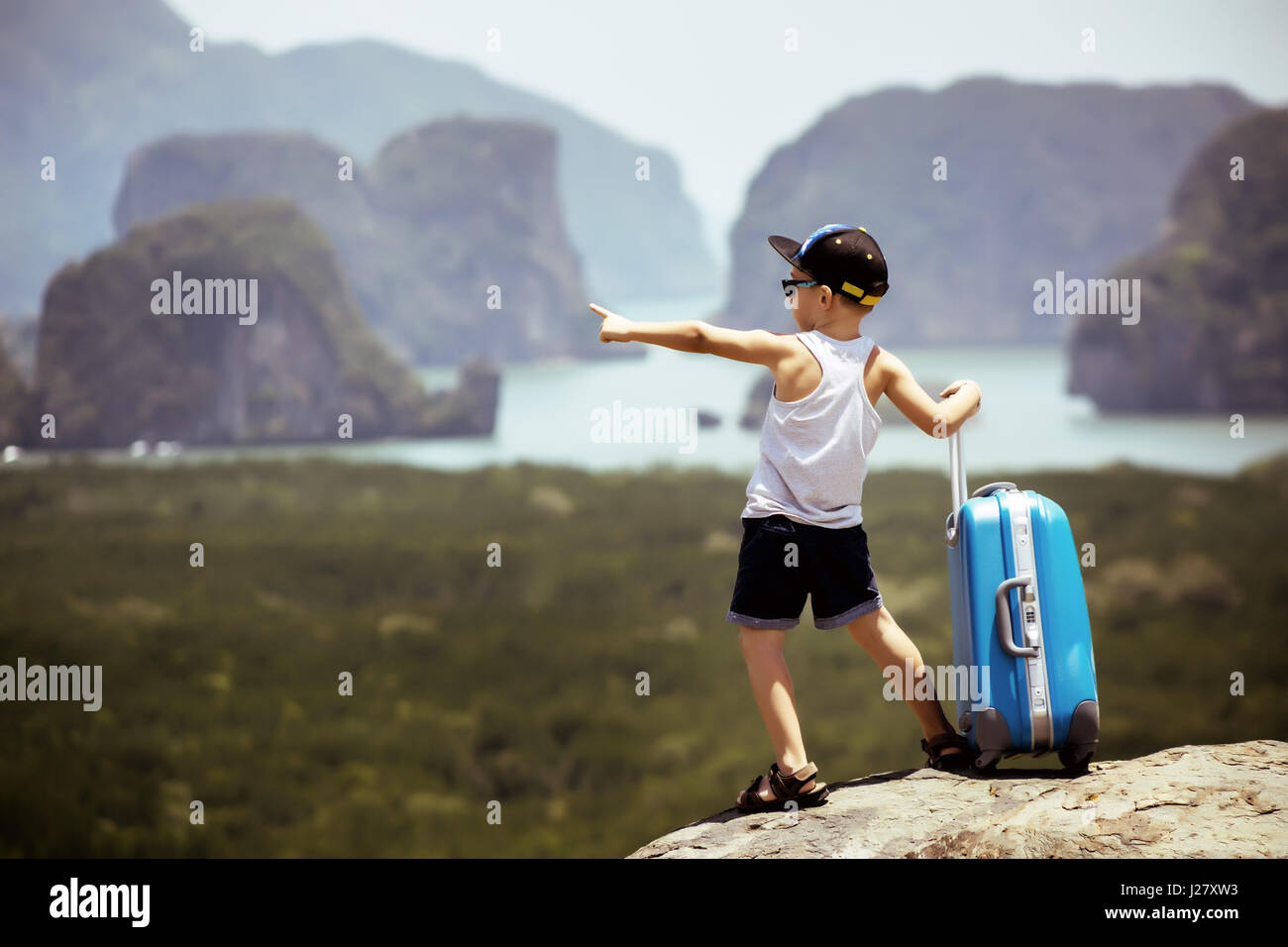 Enfant avec cas bagages travel concept Banque D'Images