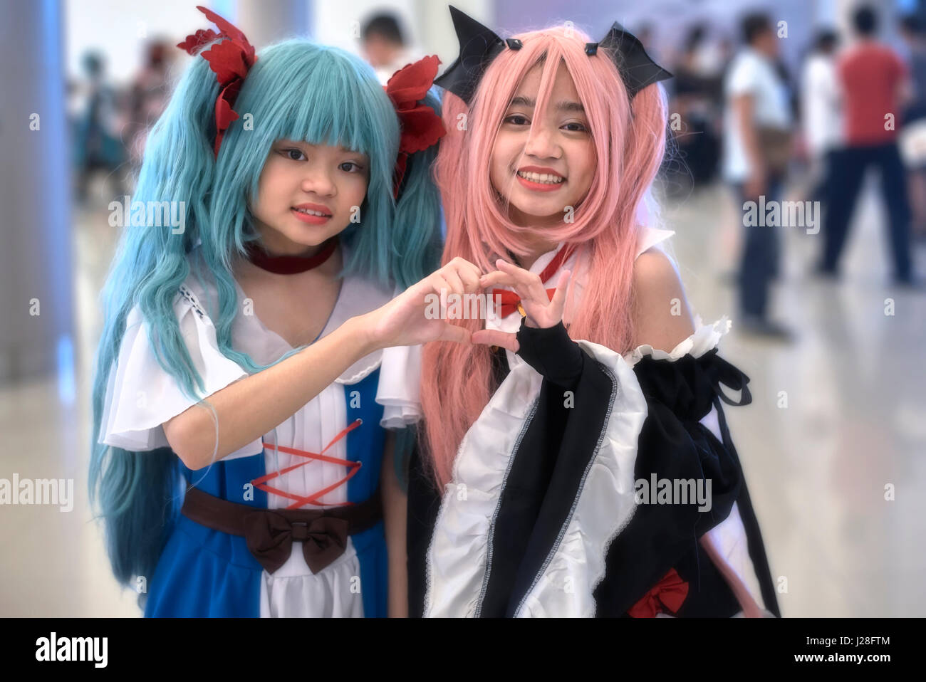 Comic con filles. Sœur aînée et sœur cadette, 17 et 13 ans, Cosplay, Bangkok, Thaïlande, 2017 Banque D'Images