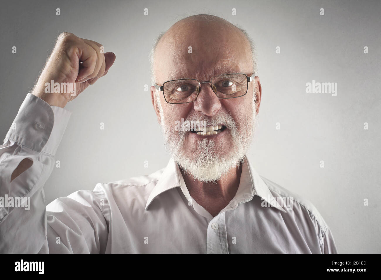 Vieil homme étant mad Banque D'Images