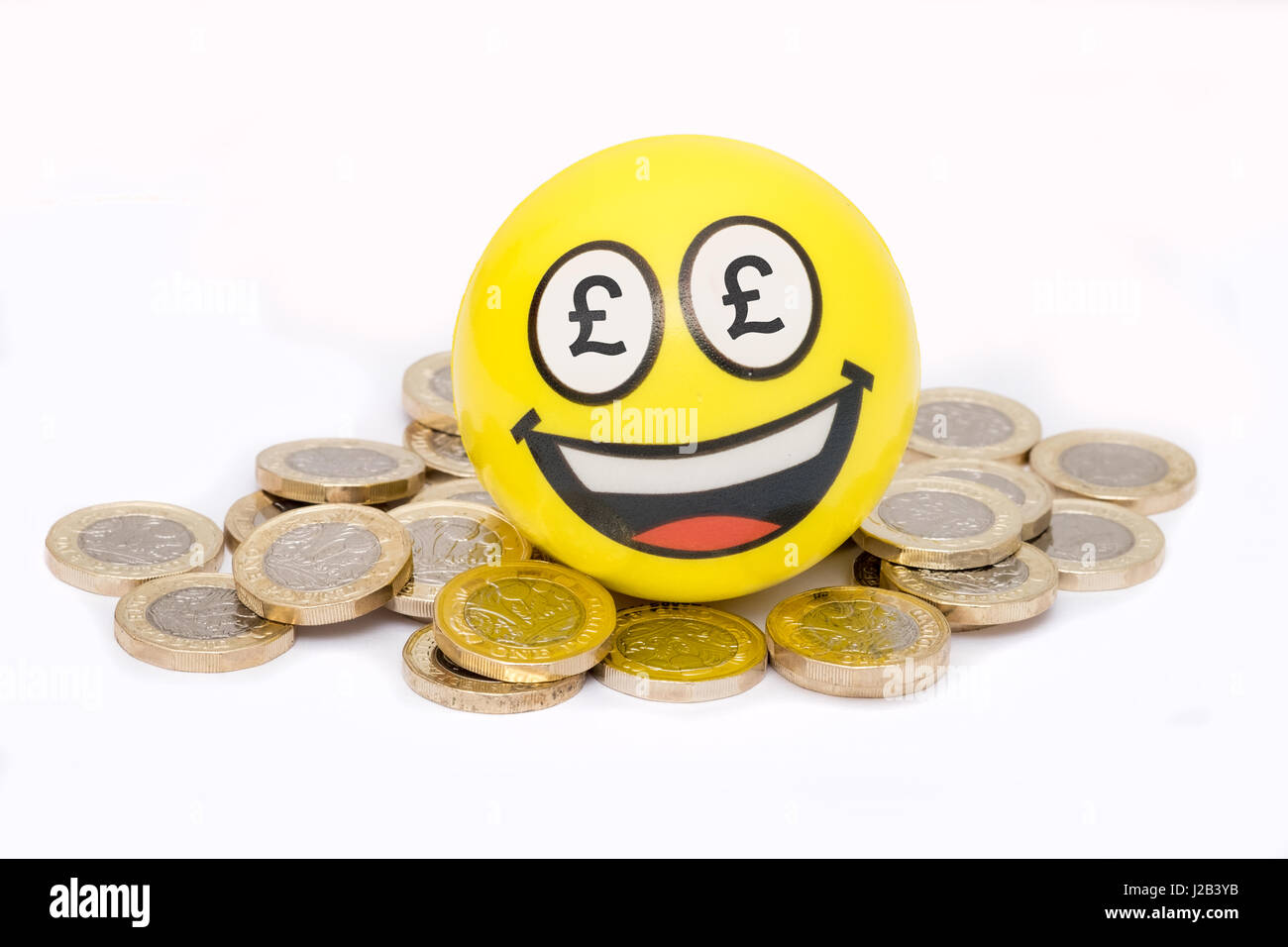 Happpy sur emoji pile de pièces Livre britannique Banque D'Images