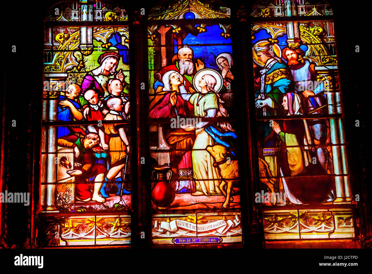 Sainte Geneviève, patronne de Paris, les vitraux de l'église Saint Séverin, Paris, France. Saint Genevieve a vécu à Paris entre 400 à 512 AD. Saint Severin l'une des plus anciennes églises Paris situé dans le Quartier Latin. Construit dans les années 1500 Banque D'Images