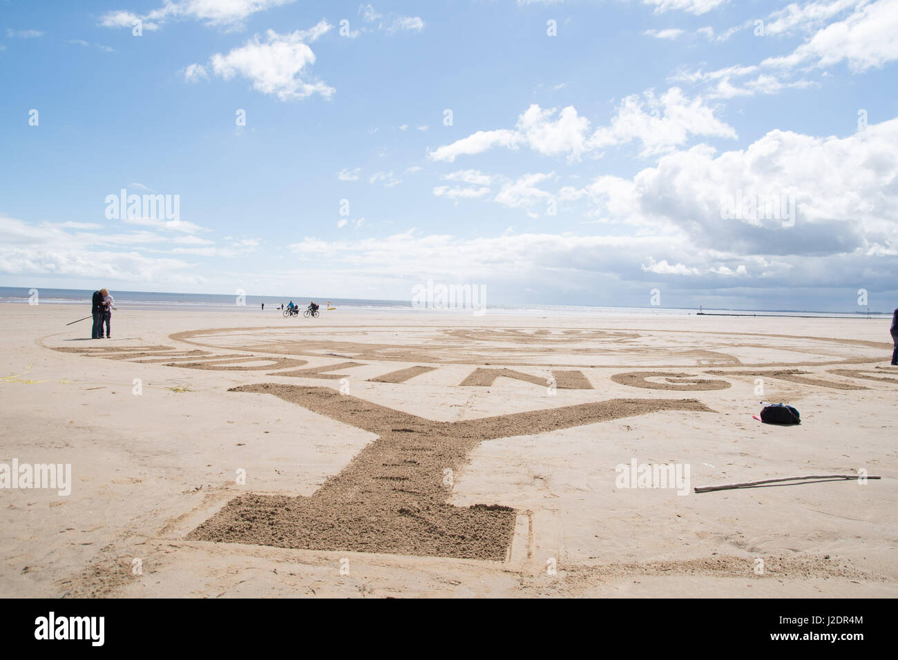 Artistes prendre un repos de leur art du sable sur le front de plage de Bridlington Banque D'Images