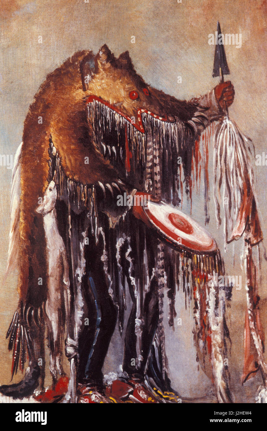 1832 Historique Catlin peinture d'un homme médecine Blackfeet habillée d'une robe de peau d'ours décorés Banque D'Images