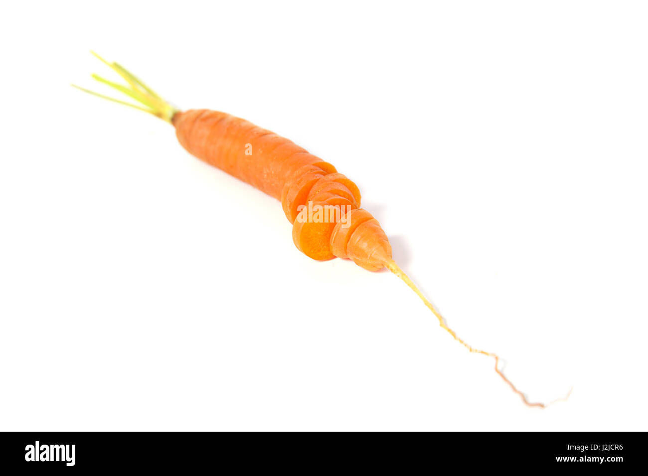 Le jus de carotte frais sur le fond blanc Banque D'Images