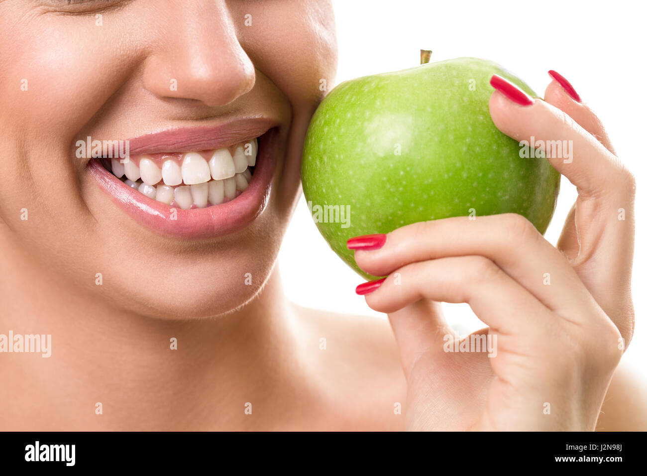 Sourire parfait avec la pomme verte, propre, sain concept des dents blanches Banque D'Images