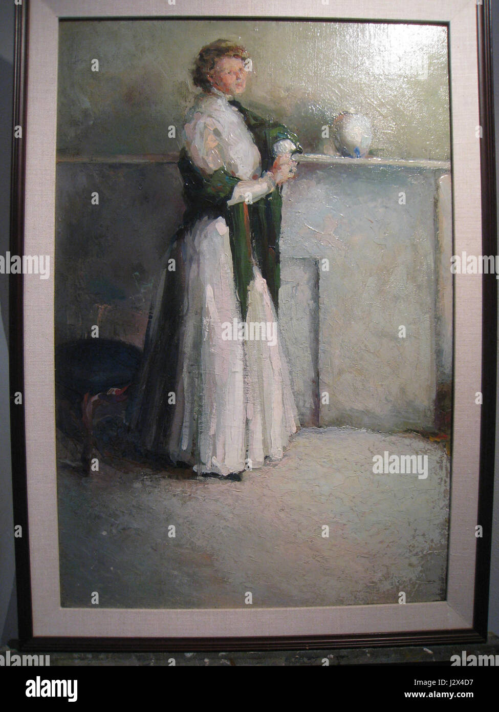 'Portrait de Louise Michaelis' de Charles Demuth, peint en 1907, capture un style distinctif du début du XXe siècle. Demuth était connu pour son approche precisioniste de l'art, et ce portrait reflète son habileté à capturer la personnalité par l'utilisation de la forme géométrique et de la couleur. Banque D'Images