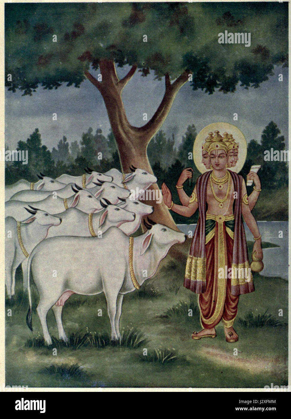 Une représentation du Dieu hindou Brahma accordant une bénédiction aux vaches, symbolisant la faveur divine et la protection du bétail dans la mythologie hindoue. Banque D'Images