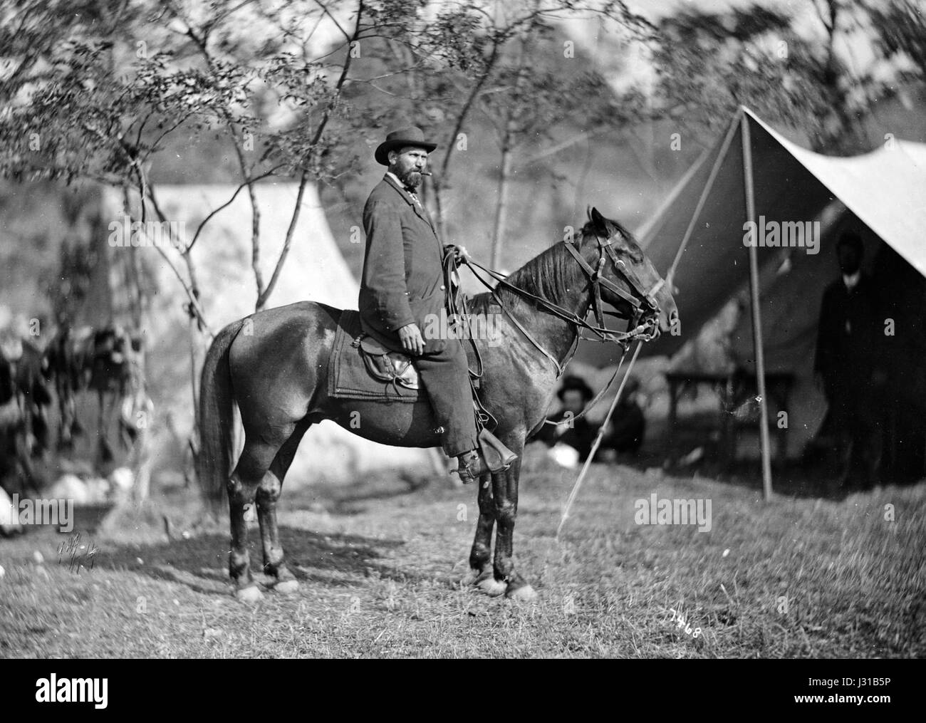 Une photographie d'Allan Pinkerton, fondateur de la Pinkerton National Detective Agency, à cheval en 1862. L'image capture un moment dans la vie d'une figure éminente de l'histoire de l'application de la loi américaine. Banque D'Images