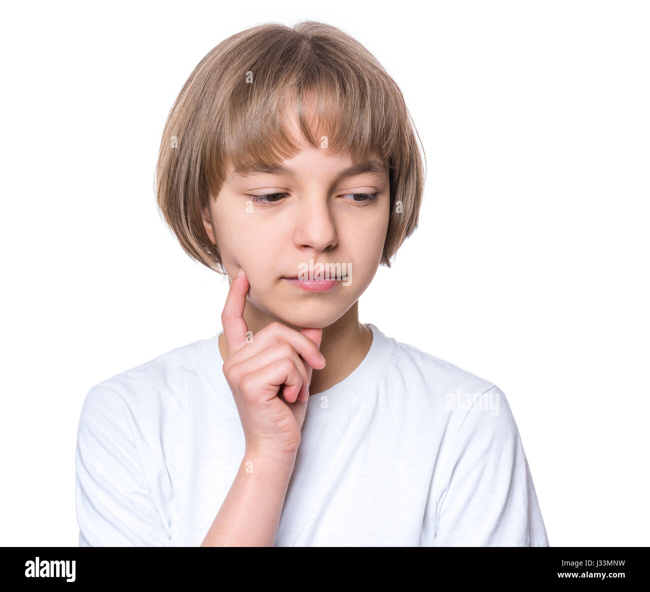 Petite fille en blanc T-shirt Banque D'Images