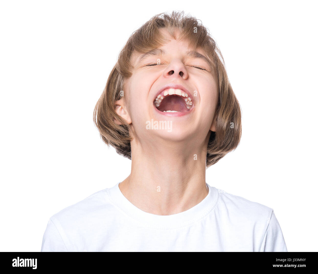 Petite fille en blanc T-shirt Banque D'Images