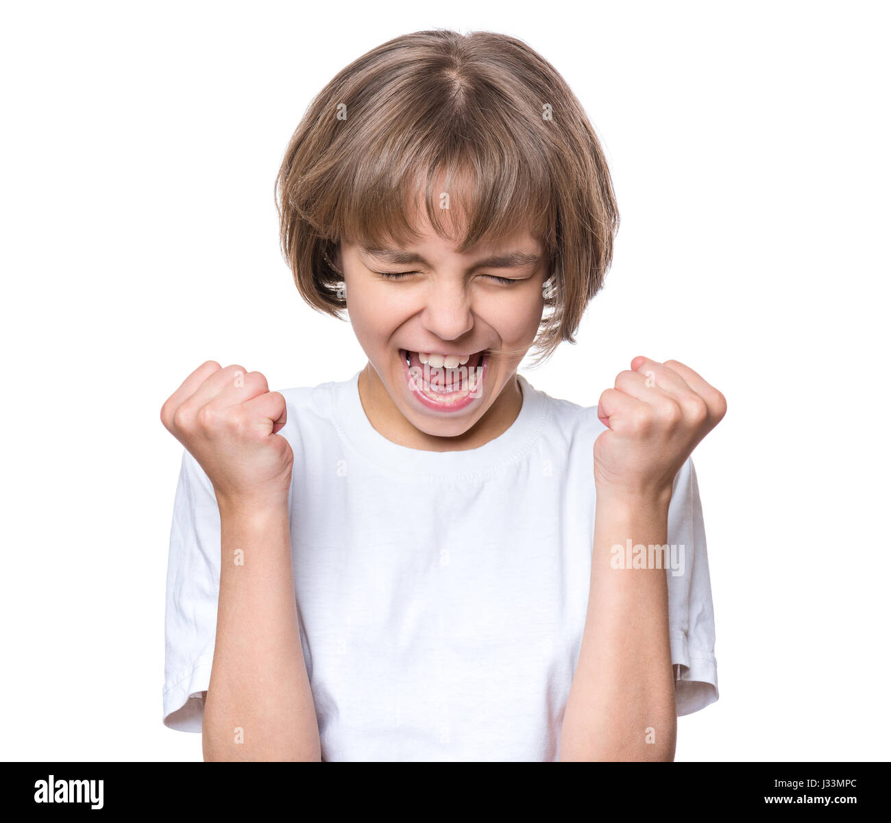 Petite fille en blanc T-shirt Banque D'Images