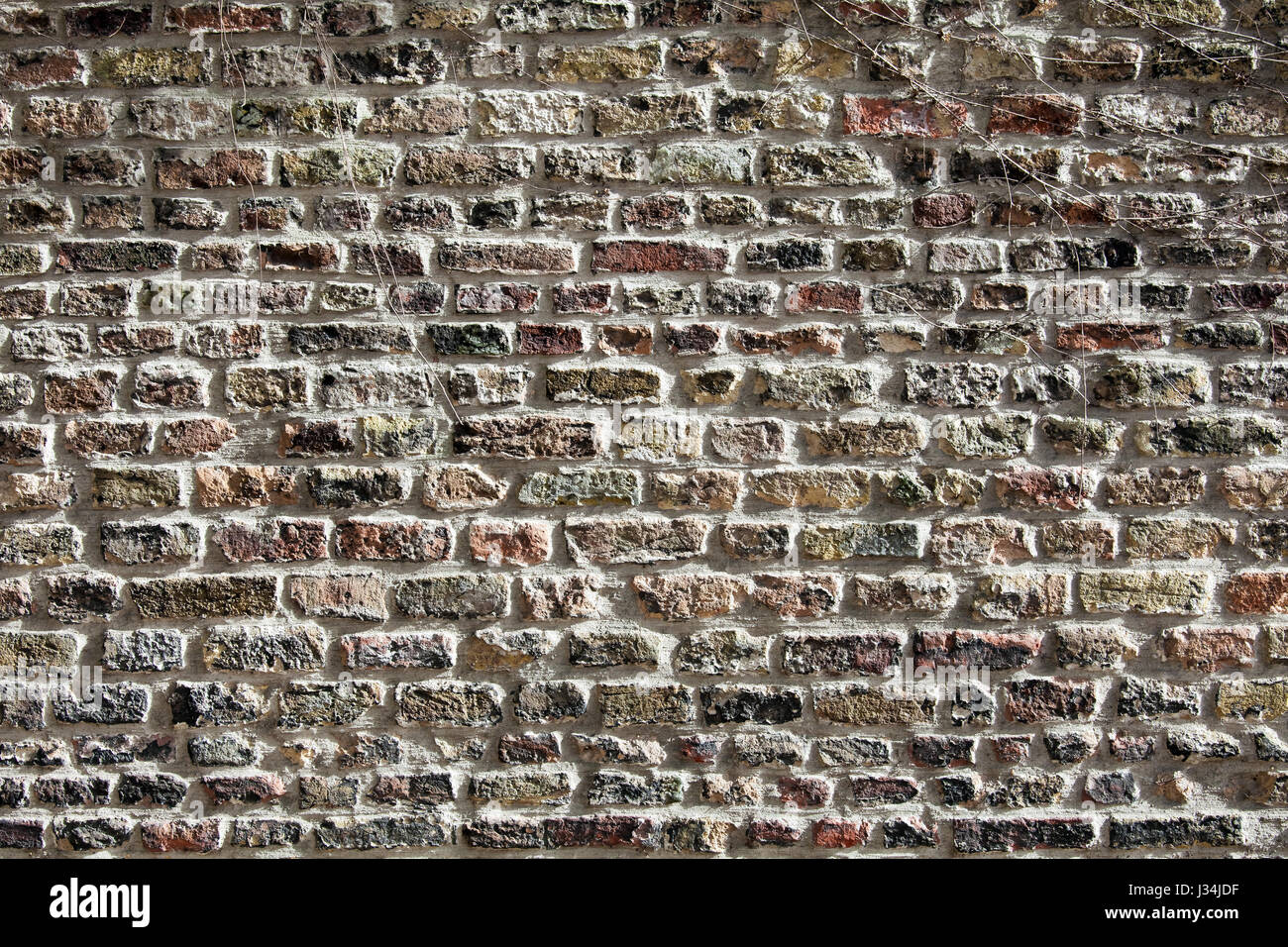 Mur de briques noir grunge Banque D'Images