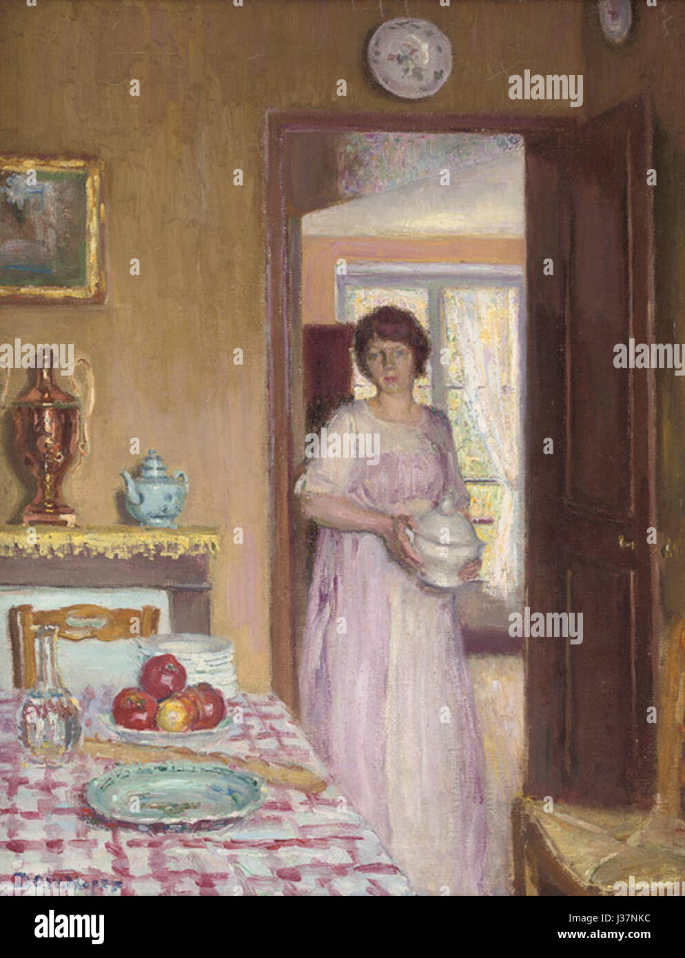 David Widhopff fixant la table pour le déjeuner Banque D'Images