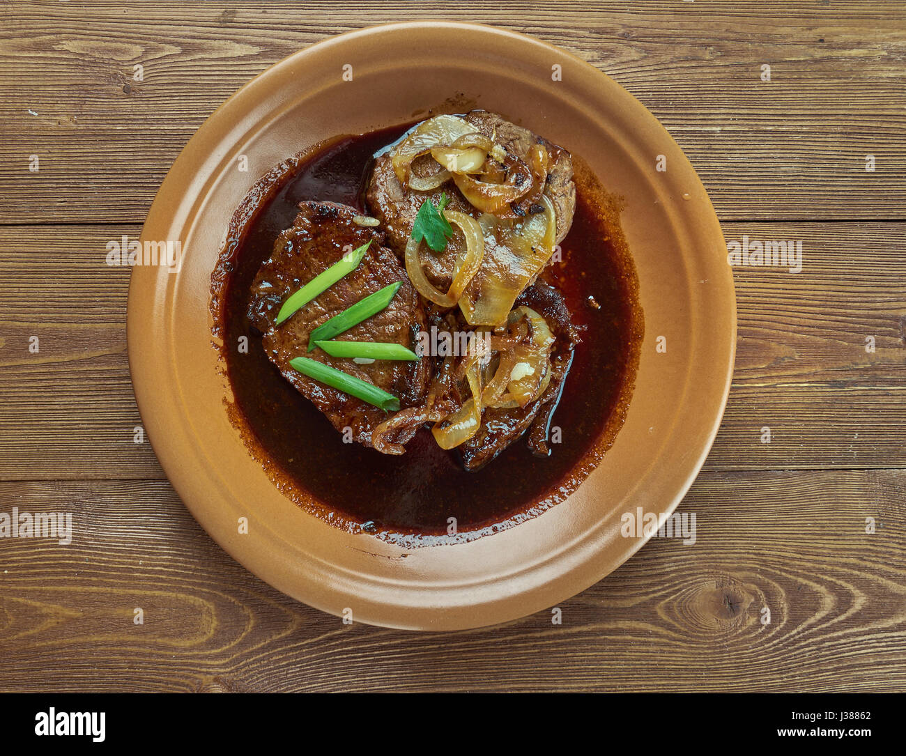 Bistek - mexicaine plat de morceaux de salé et poivré,surlonge servi dans les tortillas comme un taco. Banque D'Images