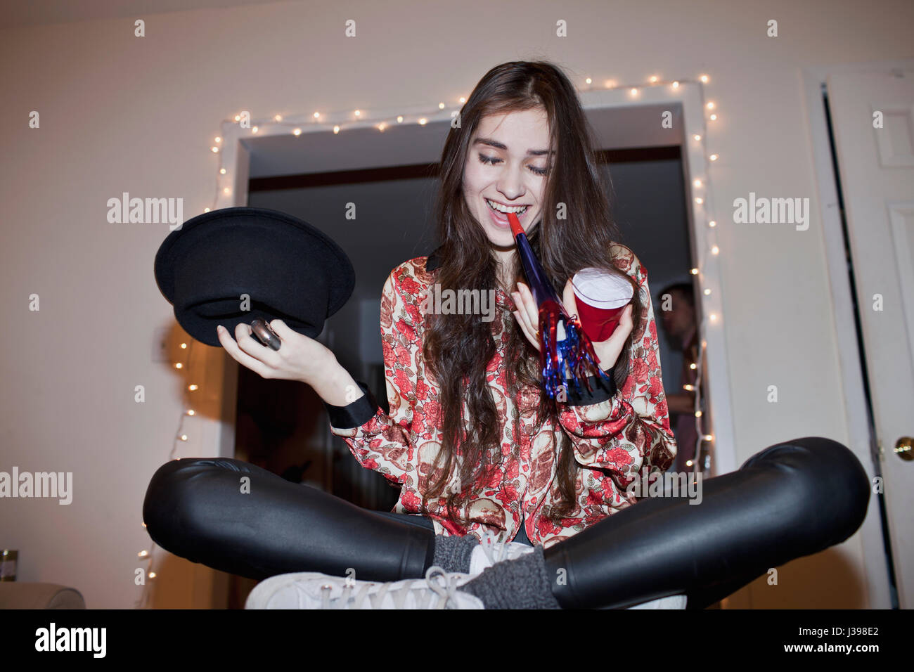Jeune femme lors d'une fête Banque D'Images Jeune femme lors d'une fête Banque D'Images