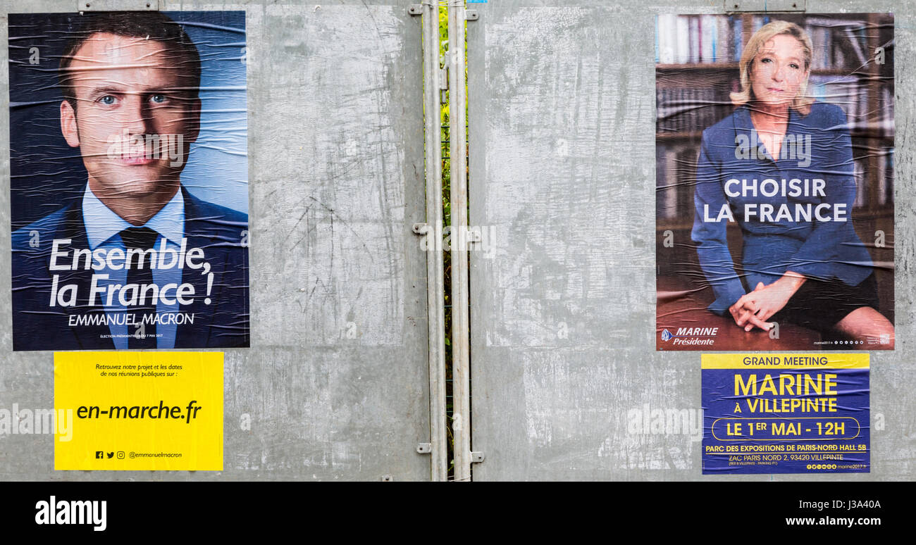 FRANCE,Mai 03,2017 : Les affiches électorales afficher les deux autres candidats à l'élection présidentielle française Emmanuel Macron et Marine Le Pen qui com Banque D'Images