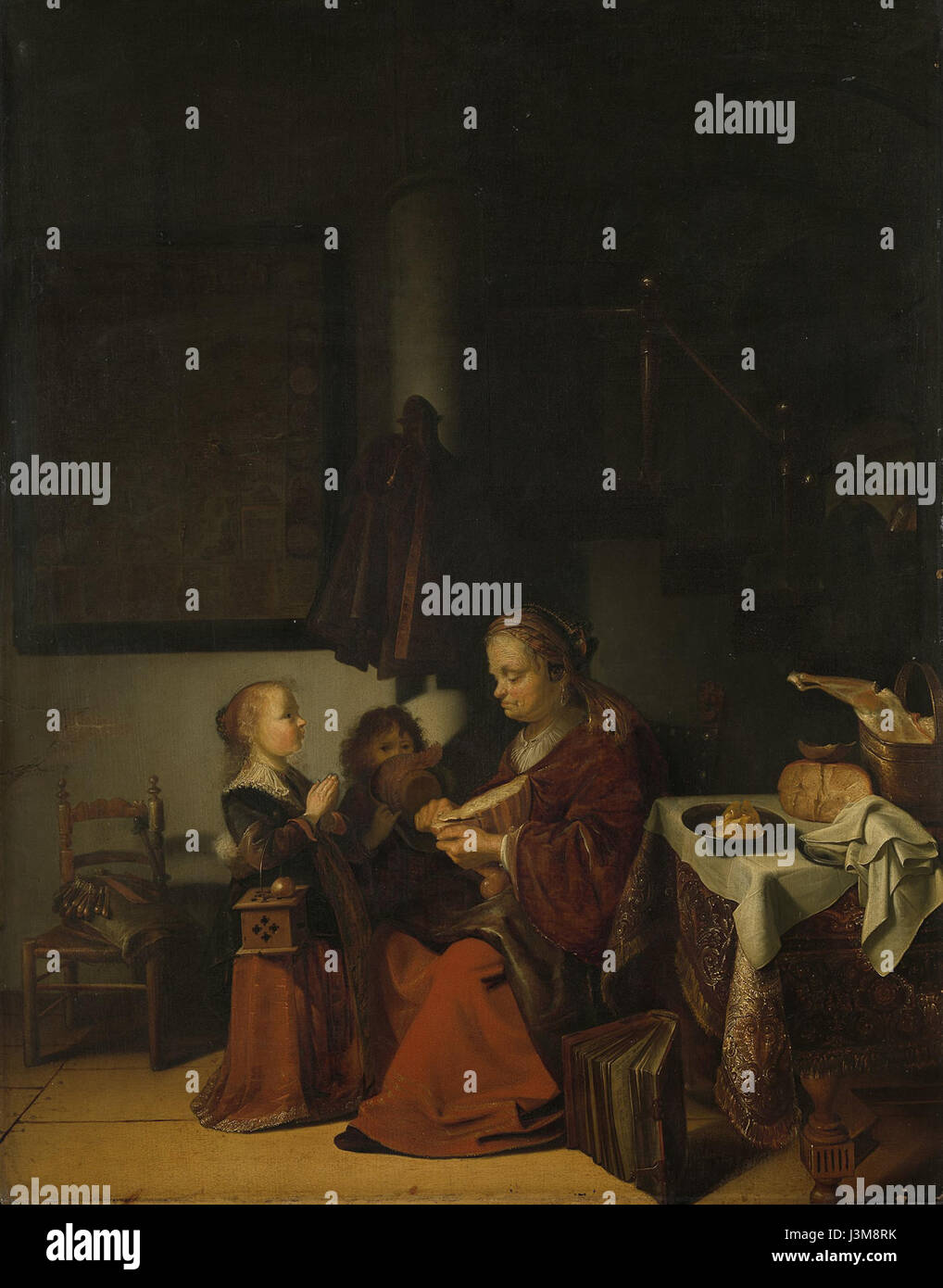Cette peinture intitulée 'Het ontbijt' (le petit déjeuner) fait partie de la collection Rijksmuseum, mettant en valeur l'art de genre néerlandais du XVIIe siècle. L'œuvre présente probablement des scènes de la vie quotidienne. Banque D'Images