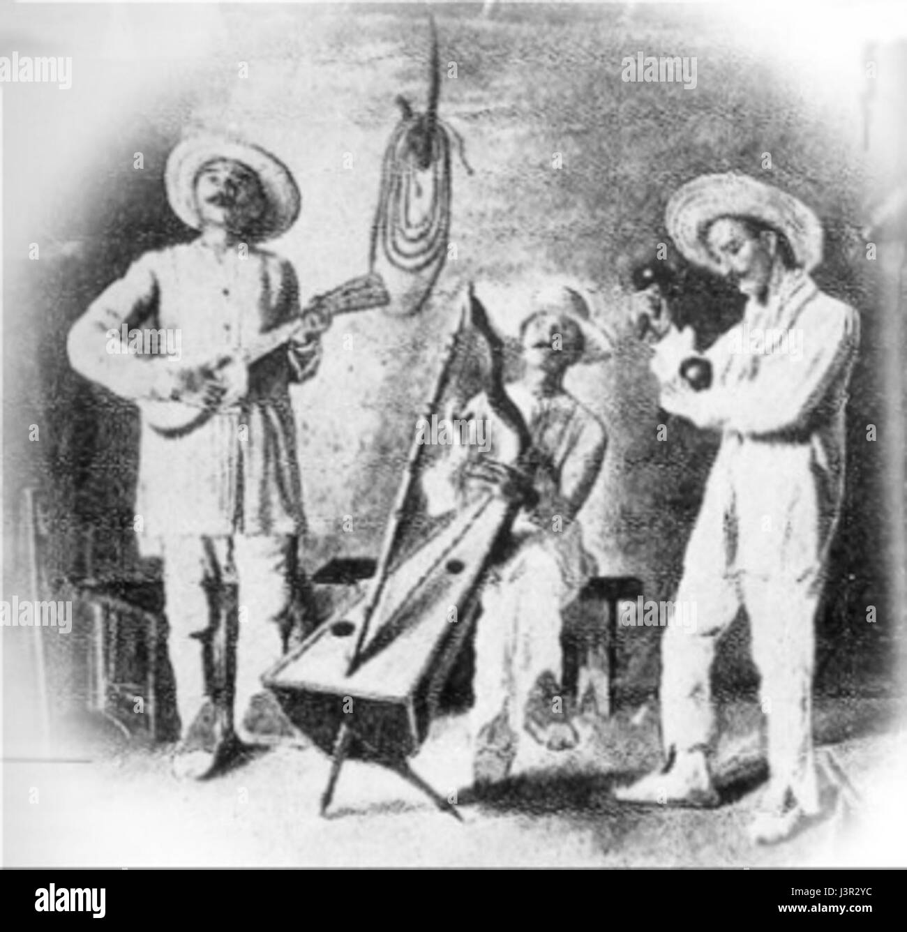 Cette photographie représente une performance de Joropo, une musique et danse folkloriques traditionnelles latino-américaines originaires du Venezuela et de Colombie. L'image met en valeur les costumes vibrants et le rythme vif de la performance. Banque D'Images