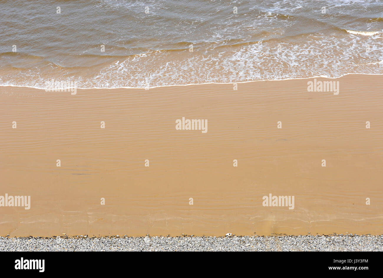 Bord de mer à roder sur une plage de sable sur le littoral de Norfolk. Banque D'Images