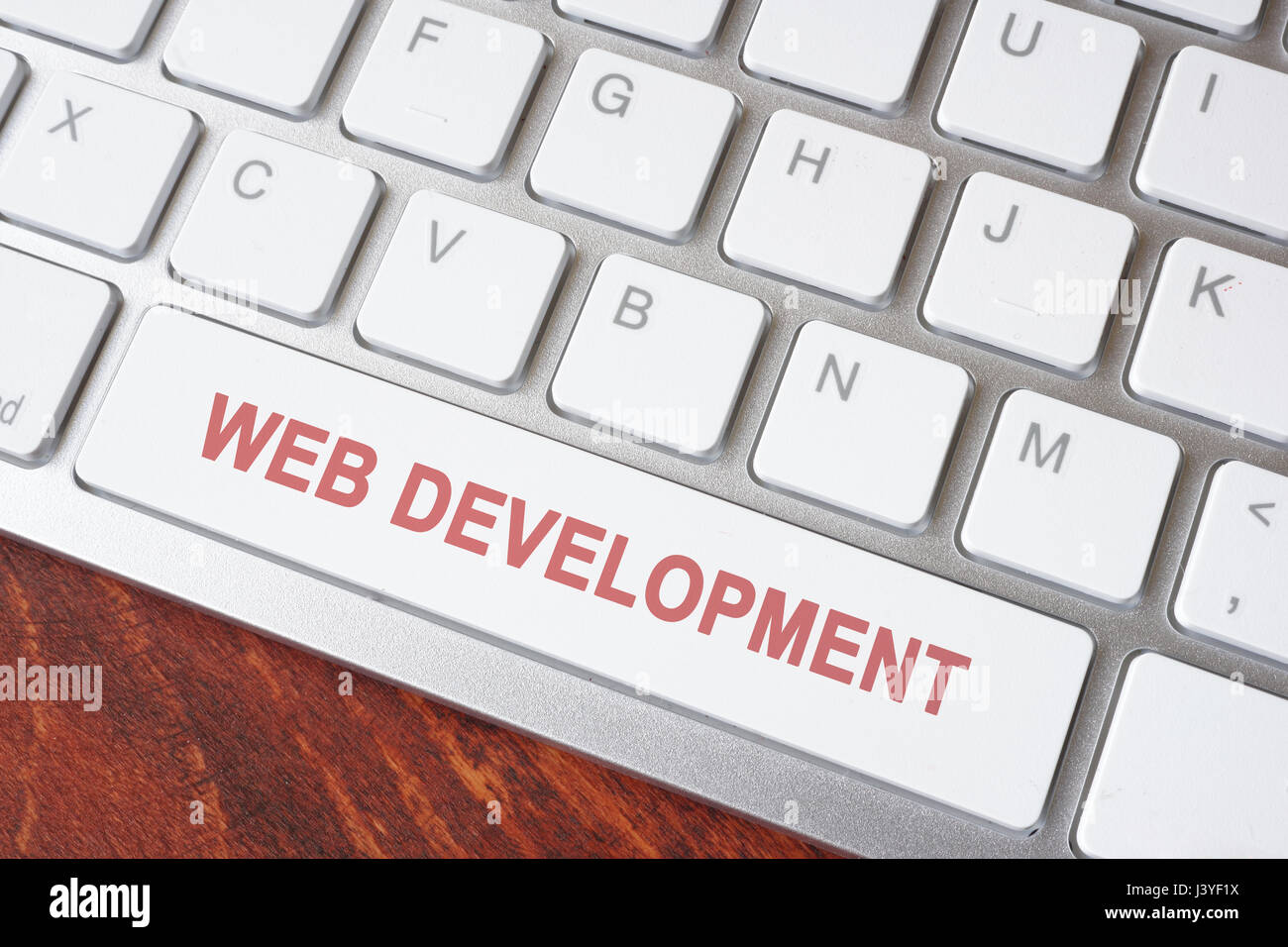 Bouton de clavier avec mots développement Web. Banque D'Images