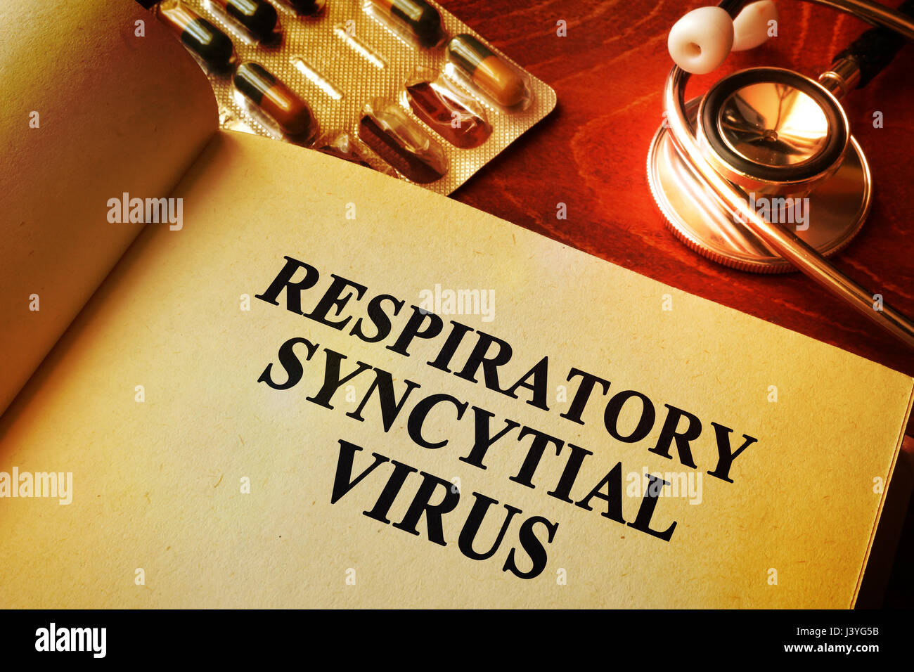 Titre Livre avec le virus respiratoire syncytial (VRS). Banque D'Images