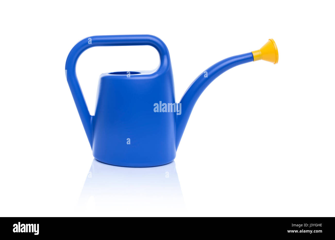 Arrosoir pour arroser les fleurs. Banque D'Images