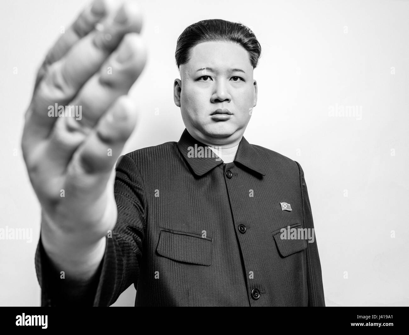 Chef suprême de la Corée du Nord Kim Jong un sosie lors de sa visite à Hong Kong. Kim Jong-Un pose pour des portraits en studio et a rencontré Obama et Trump. Banque D'Images