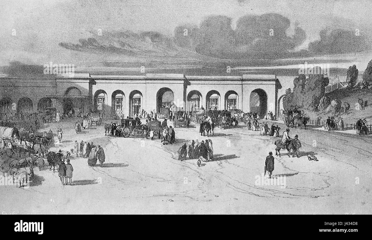 Une vue historique de la gare de Londres Paddington, un centre ferroviaire clé de Londres, de l'année 1850. L'image met en valeur l'architecture et l'atmosphère animée de la gare au milieu du XIXe siècle. Banque D'Images