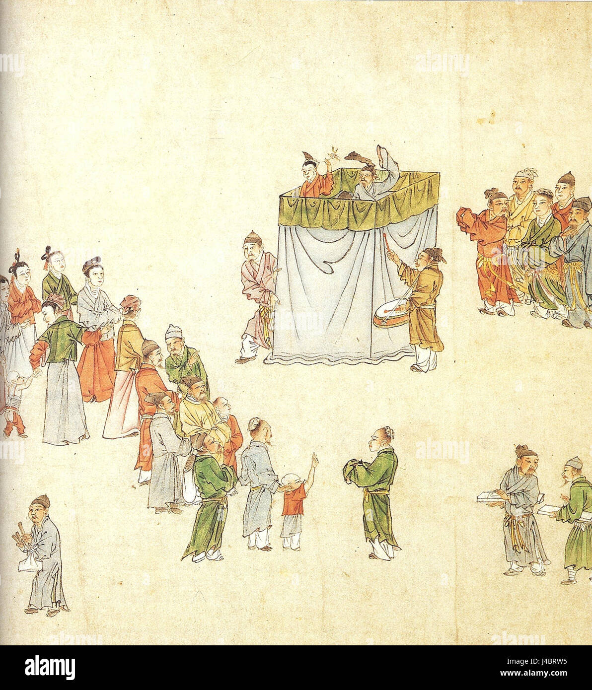 Sous la dynastie Yuan (1271-1368), les marionnettistes étaient connus pour leurs performances qui captivaient les foules. Les spectacles de marionnettes étaient une forme importante de divertissement, combinant narration et talent artistique. Banque D'Images