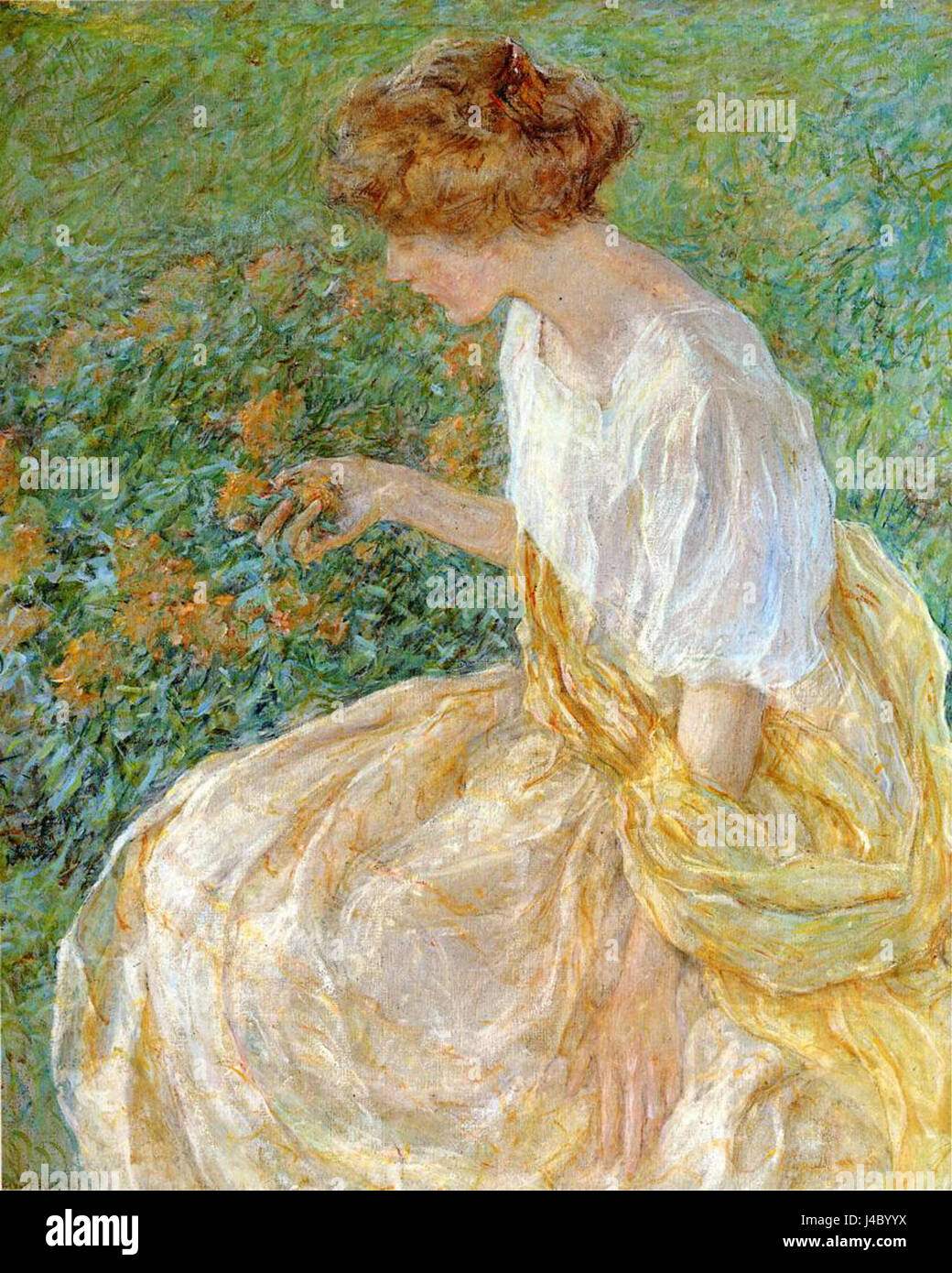 'La fleur jaune' ou 'la femme de l'artiste dans le jardin' est une peinture de Robert Lewis Reid, représentant sa femme dans un jardin. Il reflète la beauté naturelle et l'intimité de la période de temps. Banque D'Images
