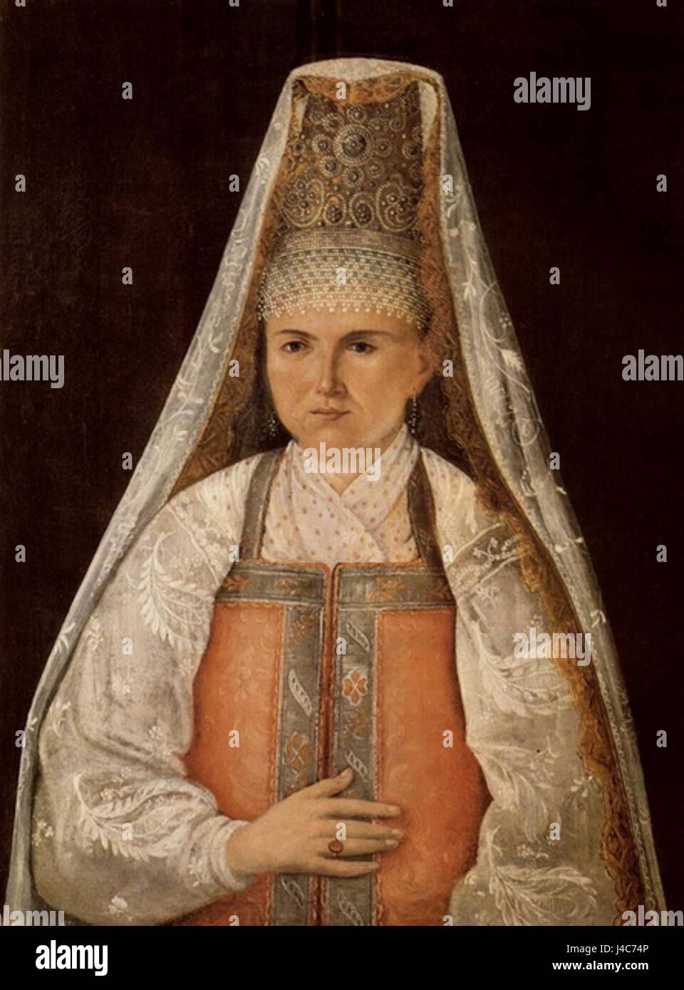 Cette peinture des années 1840 montre une paysanne vêtue d'un sarafan rose, représentant la vie rurale russe et les vêtements traditionnels de l'époque. Banque D'Images