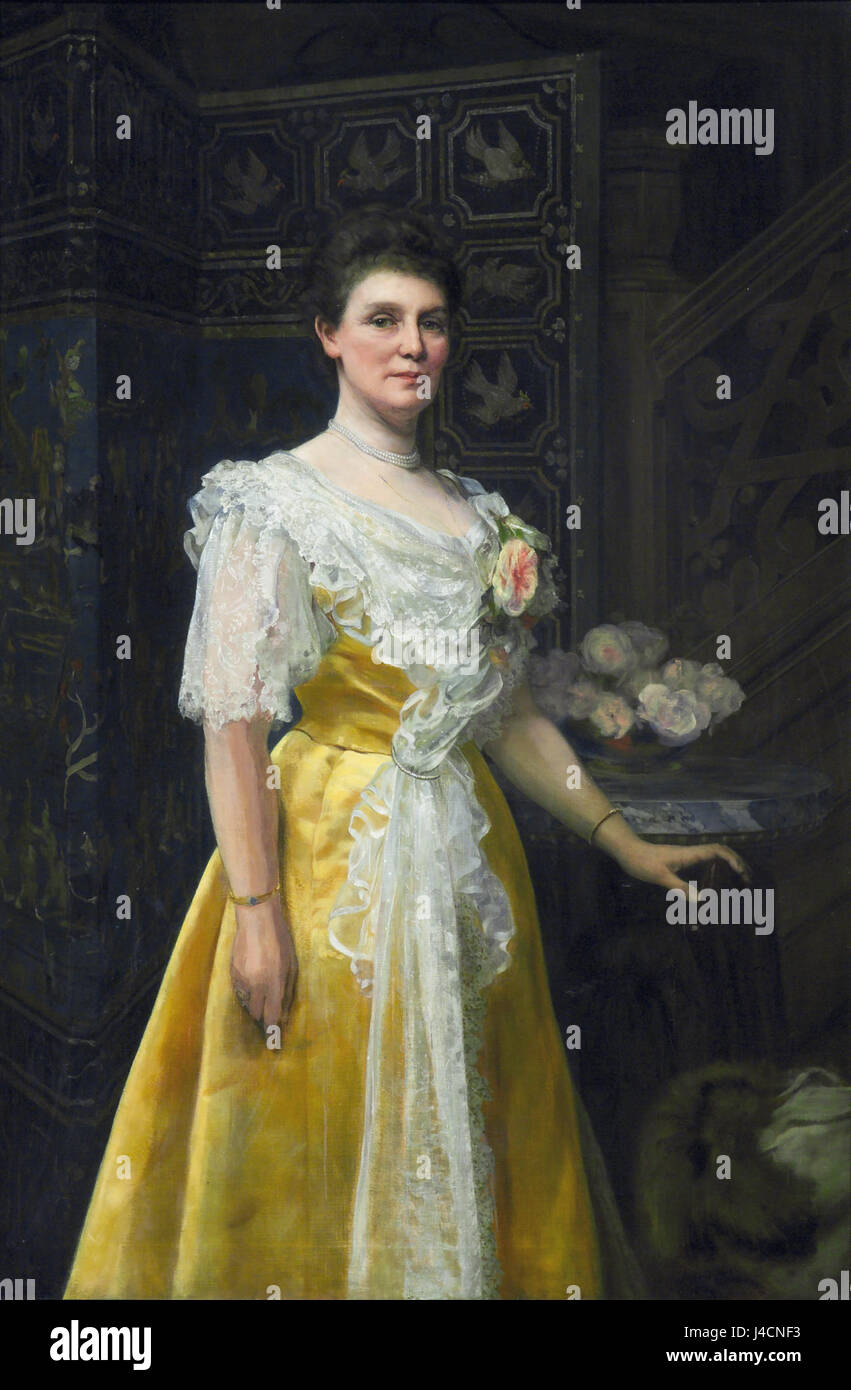 Le portrait d'une dame de William Clarke Wontner capture le style raffiné du portrait de la fin du XIXe siècle. Connu pour ses représentations détaillées et réalistes, le travail de Wontner met en évidence les subtilités de la mode victorienne et l'équilibre du sujet, reflétant son habileté à rendre les détails fins. Banque D'Images