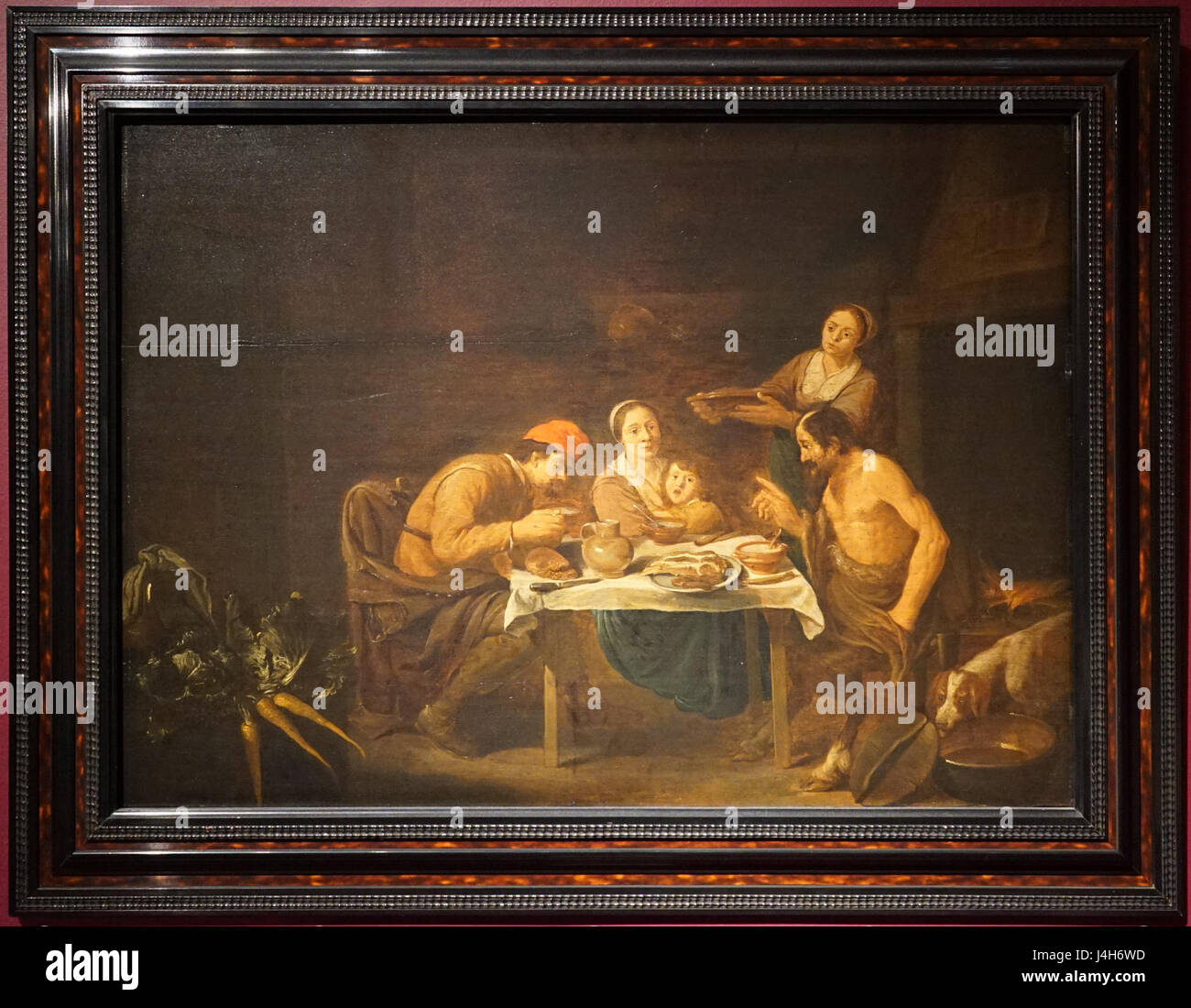 Il s'agit de la peinture *Satyre et paysans* de David Ryckaert, artiste flamand du XVIIe siècle. L’œuvre représente un satyre dans un cadre pastoral, illustrant des thèmes de la vie rurale et des figures mythiques du baroque flamand Banque D'Images