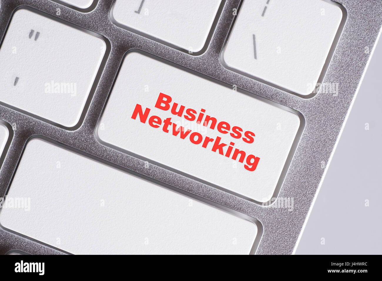 'Business Networking' mots rouges sur fond blanc - clavier en ligne, l'éducation et l'entreprise concept Banque D'Images