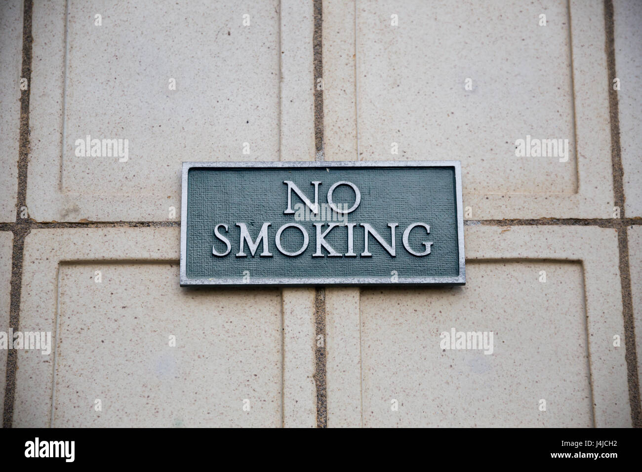 Aucun signe de fumer sur la Brique Banque D'Images