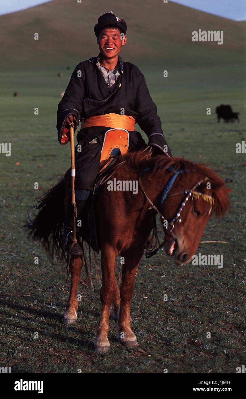 La Mongolie, l'Arkhangai, purger Mongol, homme, cheval, randonnée, vêtements, traditionnellement, afficher la caméra Banque D'Images