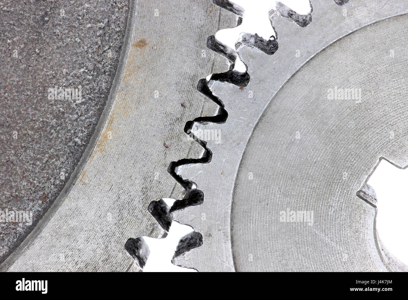 Cogs against white background Banque D'Images
