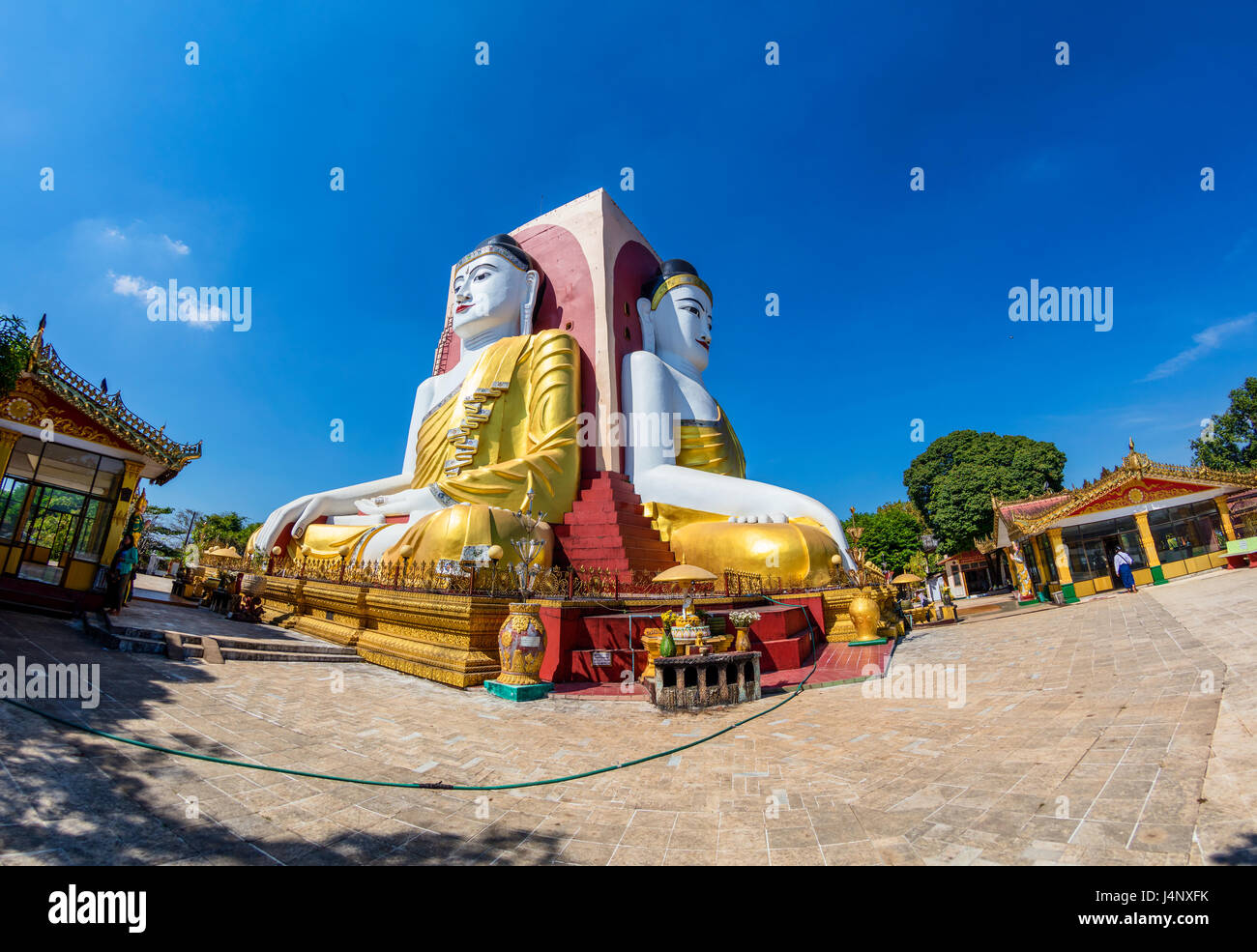 Stock Photo - Bago, le Myanmar quatre visages de Bouddha à Bouddha Kyaikpun Banque D'Images