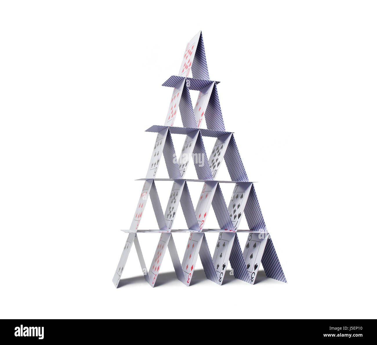 Chambre des cartes à jouer sur fond blanc Banque D'Images