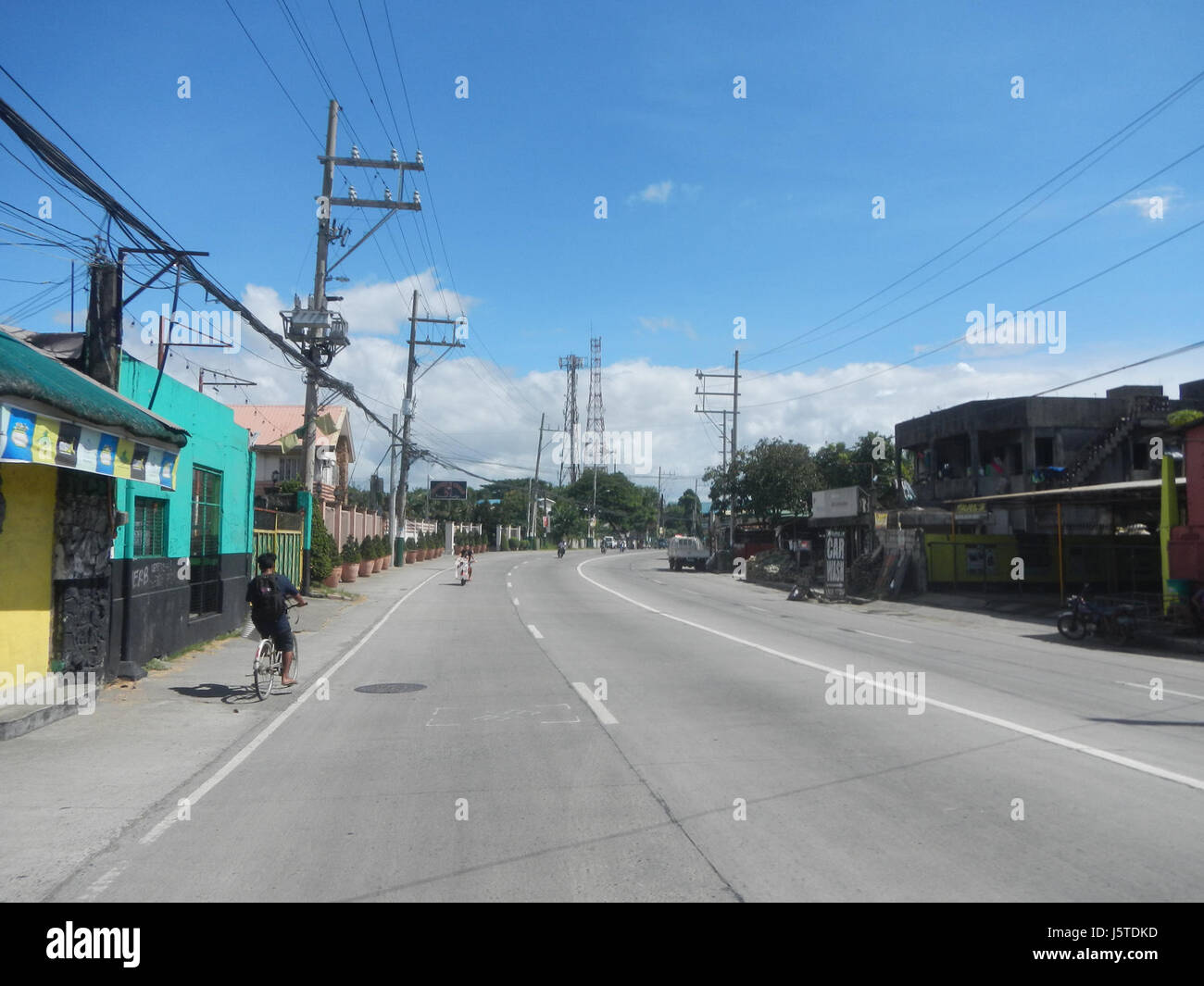 Cette région comprend les villes de Malolos, Guiguinto et Balagtas à Bulacan, situées le long de la MacArthur Highway. La région abrite des motels et d'autres entreprises desservant les populations locales et itinérantes. Banque D'Images