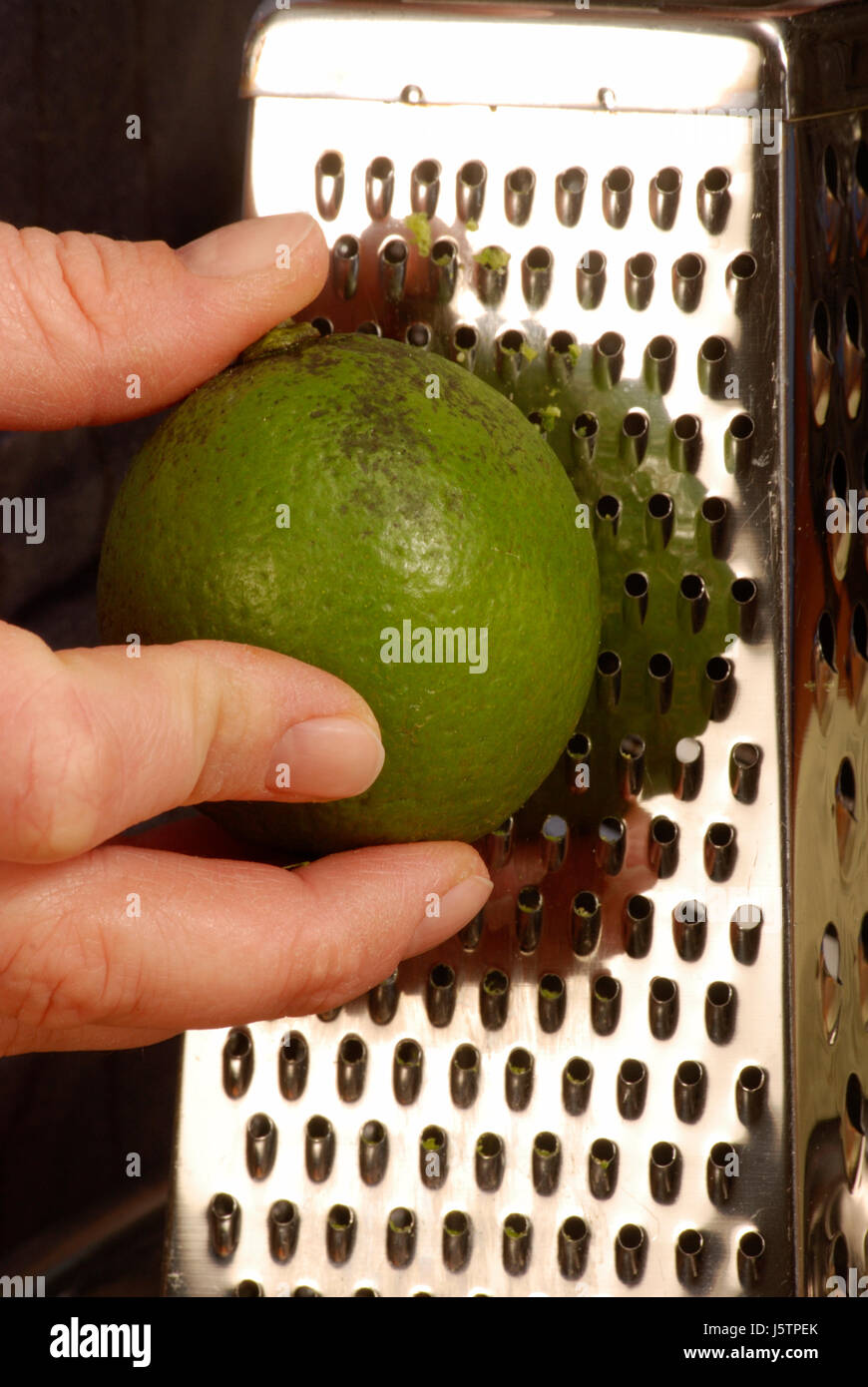 râper le citron vert Banque D'Images
