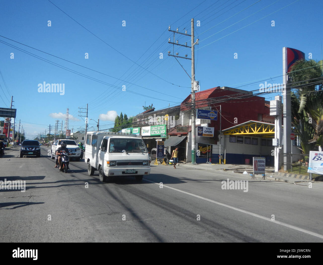 Le projet d'intersections MacArthur Highway relie Guiguinto et Balagtas à Bulacan, améliorant ainsi la circulation à travers les intersections clés. Ce développement des infrastructures est vital pour la connectivité et l'efficacité régionales. Banque D'Images