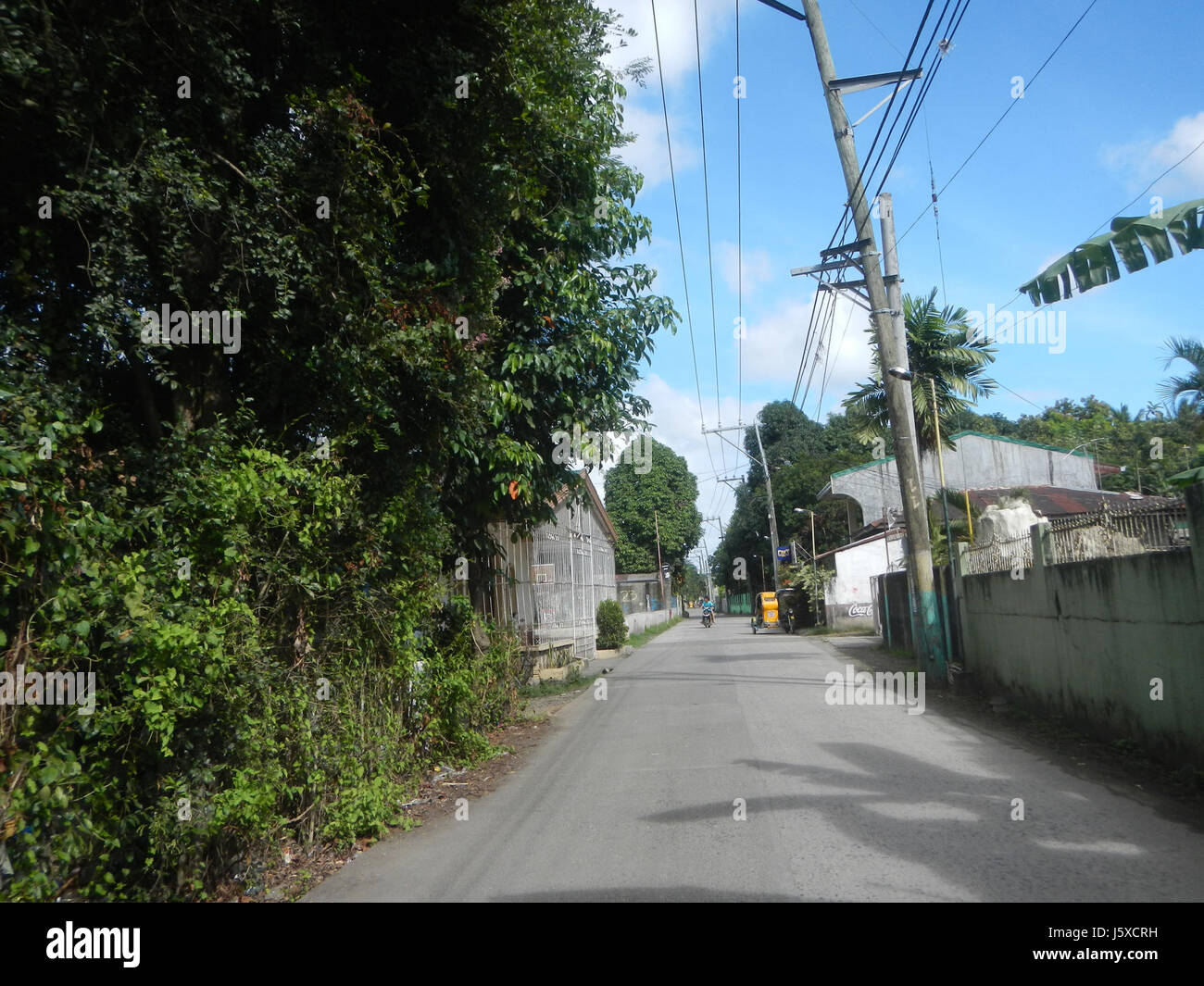 Photographie de Sipat-Dampol Farm-to-Market Road 28 à Plaridel, Bulacan, présentant les infrastructures rurales aux Philippines. Banque D'Images