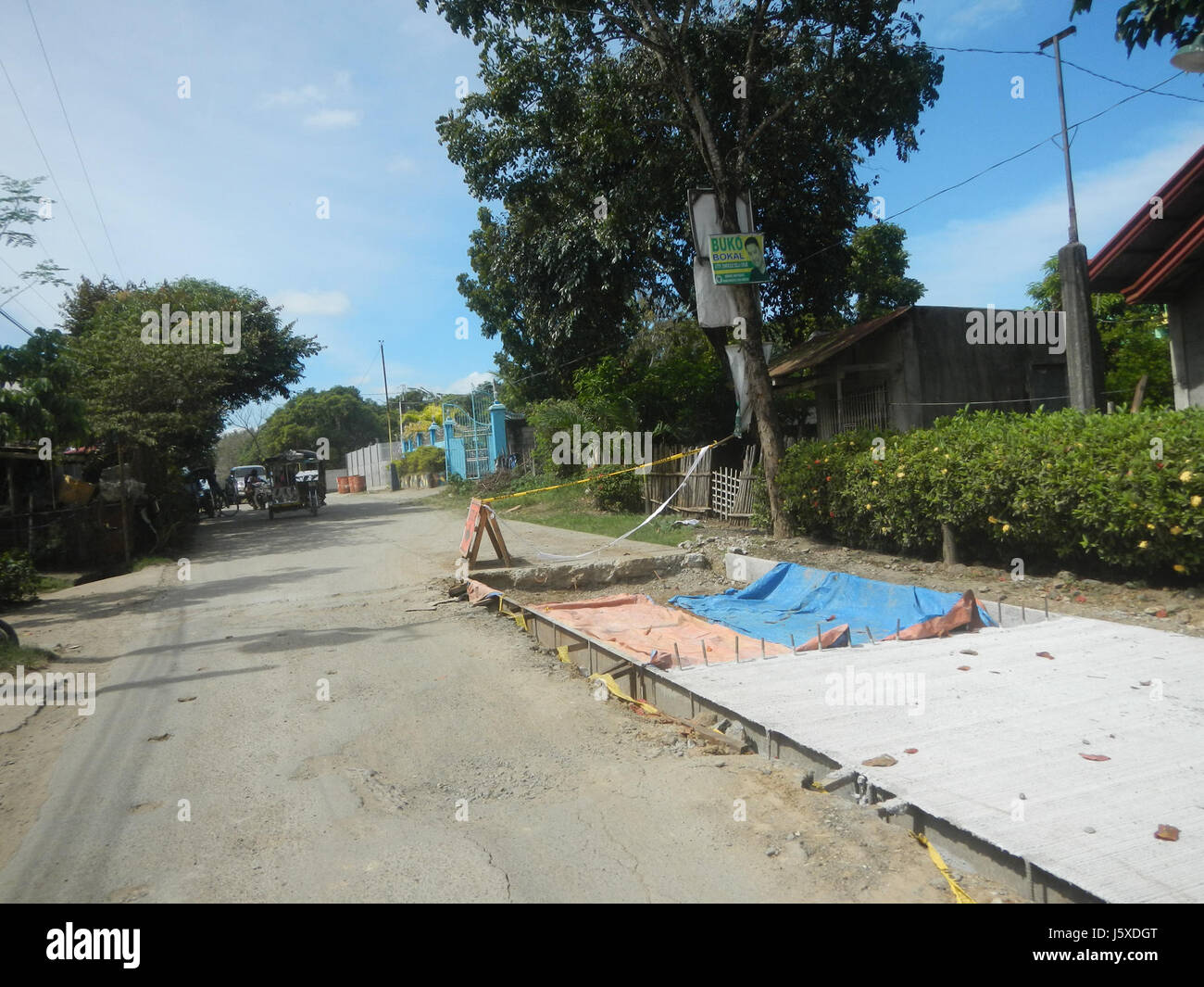 Le projet de construction le long de Poblacion Tanauan, Bustos, Bagong Barrio et Cupang à Pandi, Bulacan Road, s’inscrit dans le cadre du développement des infrastructures en cours visant à améliorer la connectivité et l’accessibilité locales. Banque D'Images
