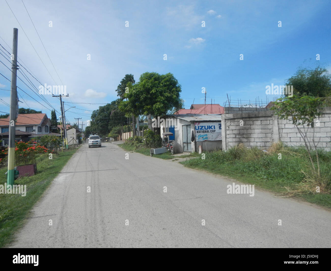 Ce titre fait référence au projet de construction de Sitio Palanas, situé à Bagong Barrio, Pandi, Bulacan. Le projet met l'accent sur l'aménagement de la route 17 du marché agricole, un développement d'infrastructure clé dans la région, conçu pour améliorer les transports et les activités économiques. Banque D'Images