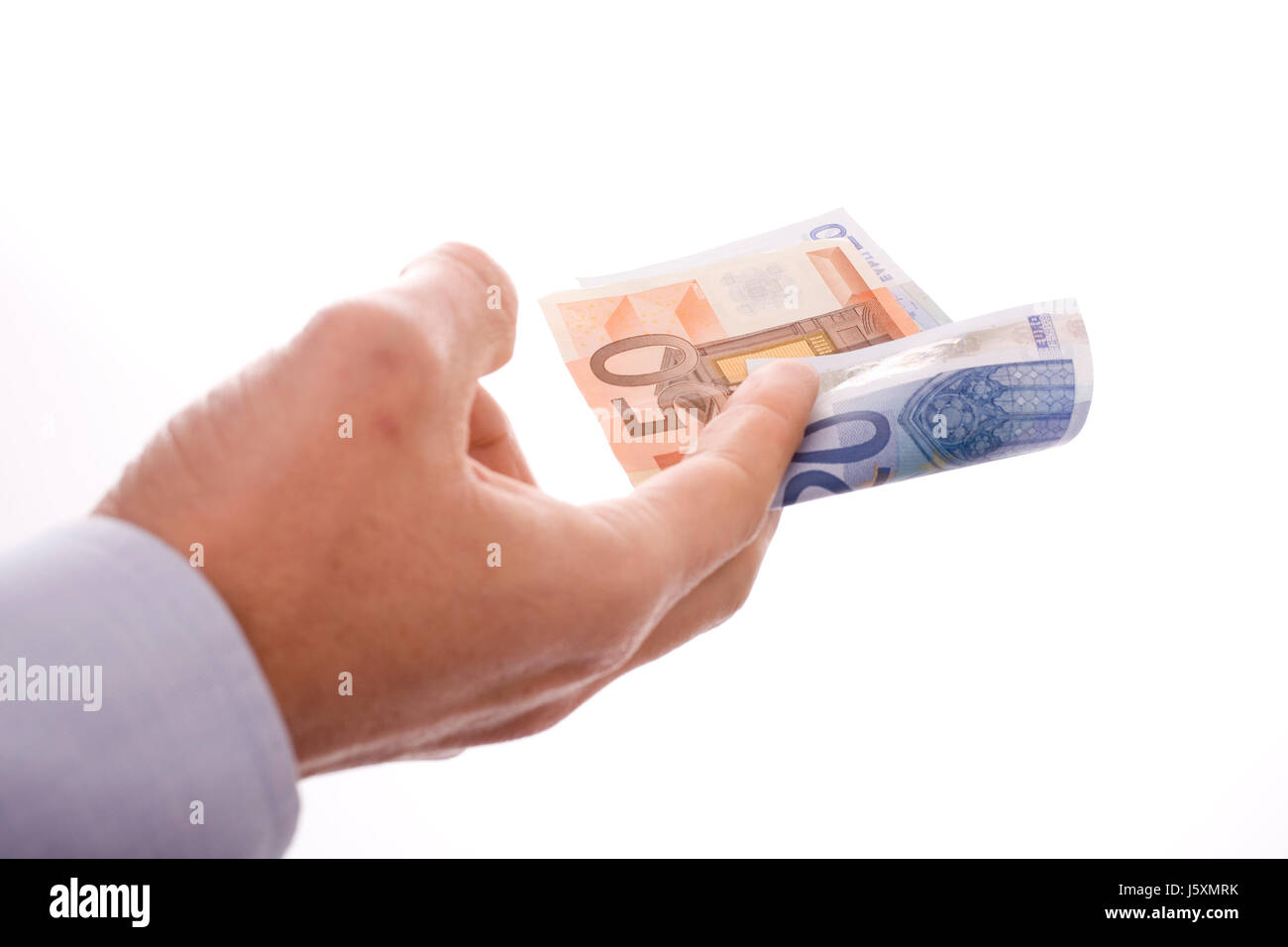 La main avec les billets en euros Banque D'Images