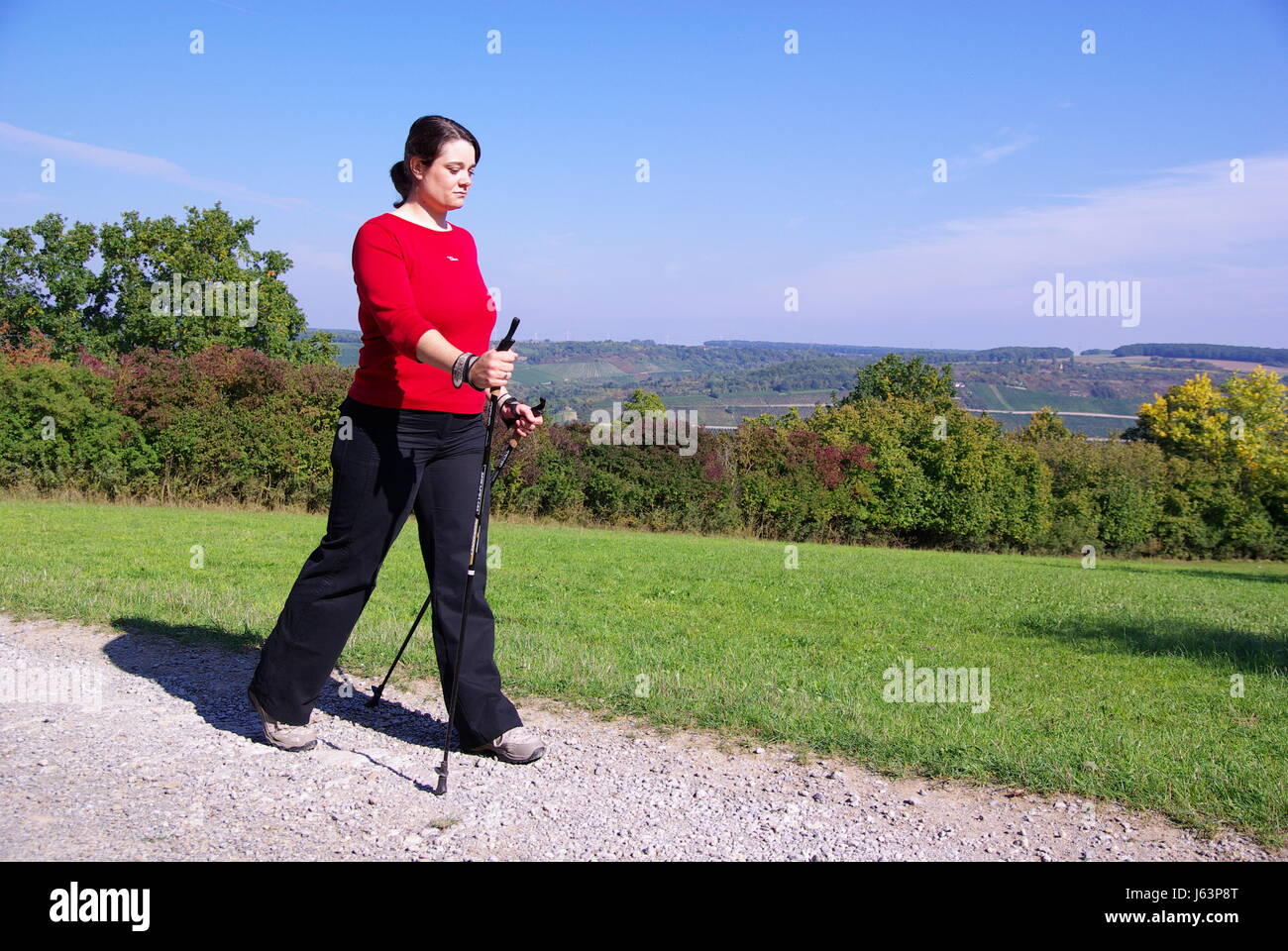 Femme temps libre temps libre temps libre loisirs sport sports la marche nordique Banque D'Images