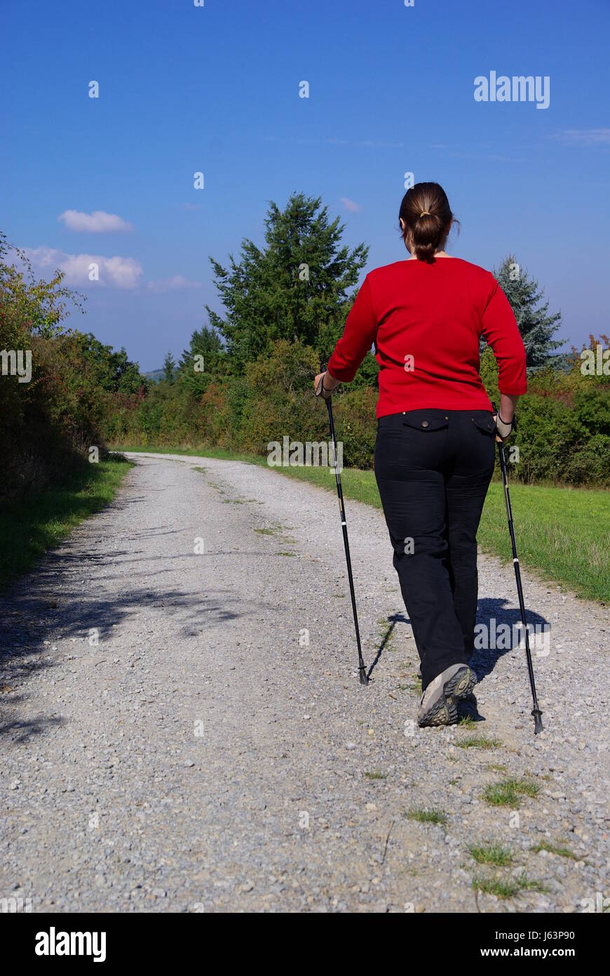 Femme temps libre temps libre temps libre loisirs sport sports la marche nordique Banque D'Images