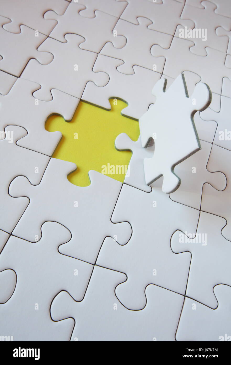 Le travail d'équipe symbolisé par Jigsaw Puzzle- Banque D'Images