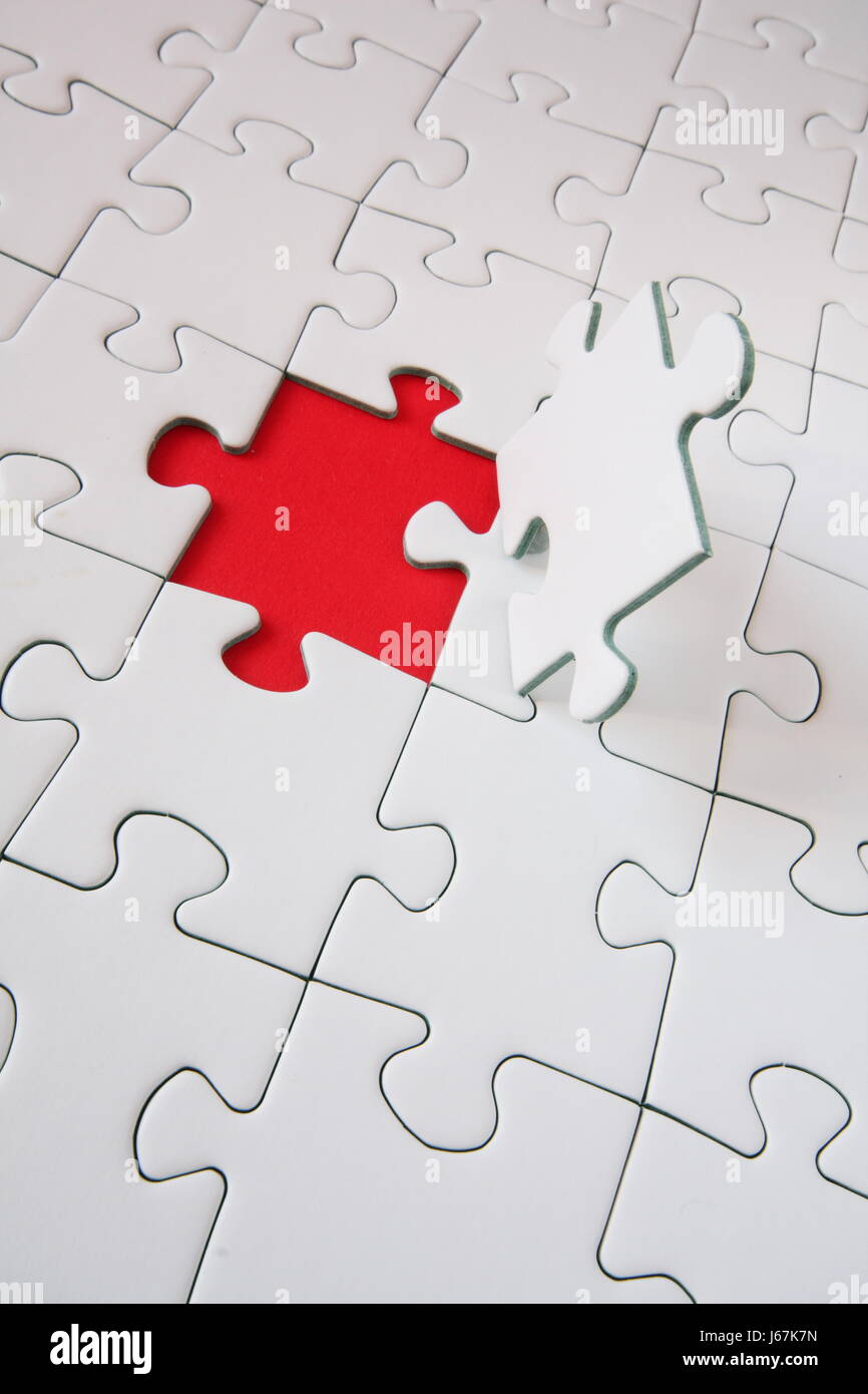 Le travail d'équipe symbolisé par Jigsaw Puzzle- Banque D'Images